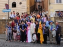 Newly wed couple surprises to see a whole group of Vietnamese pilgrims at St. Peter's square.