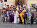 Newly wed couple surprises to see a whole group of Vietnamese pilgrims at St. Peter's square.