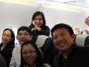 Monsignor Tuan and the Pilgrims on board an airplane ready to take off for Lisbon.